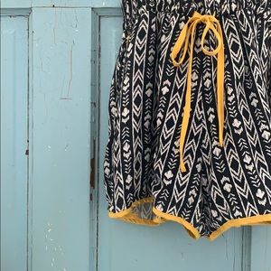 Black and yellow tank top romper